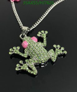 Sparkling green frog pendant with pink accents.