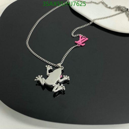 Silver frog pendant necklace with pink accent.