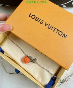 Orange charm necklace in luxury branded box.