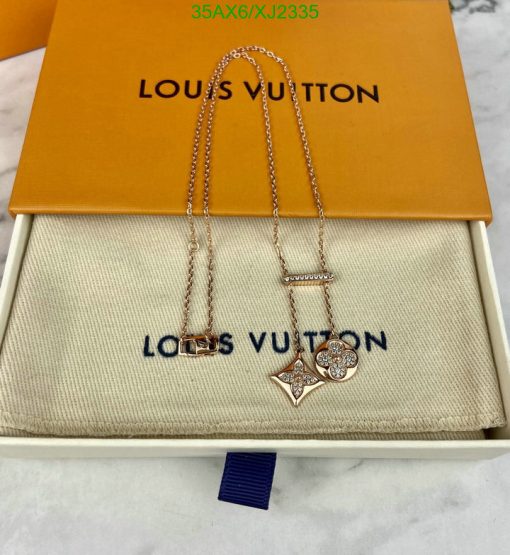 Louis Vuitton necklace in branded box, jewelry presentation.