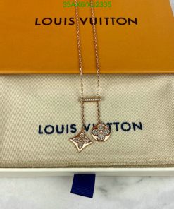 Louis Vuitton necklace with star and circle pendants.