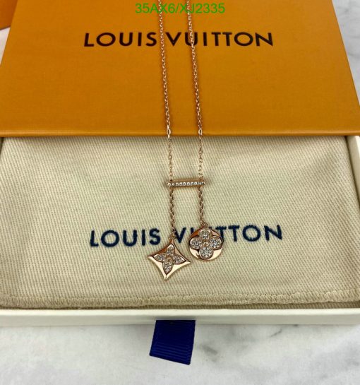 Louis Vuitton necklace with star and circle pendants.