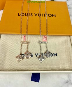 Louis Vuitton branded pendant necklaces displayed in box.