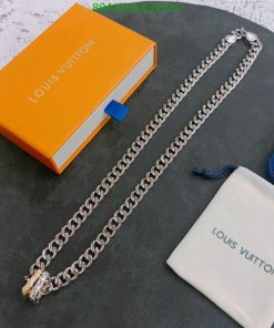 Louis Vuitton branded packaging and silver chain accessory.